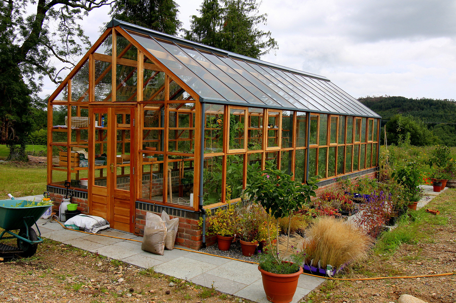 Traditional wooden Greenhouse on dwarf wall - installation Owen Chubb Landscapers, Tel 087-2306 128