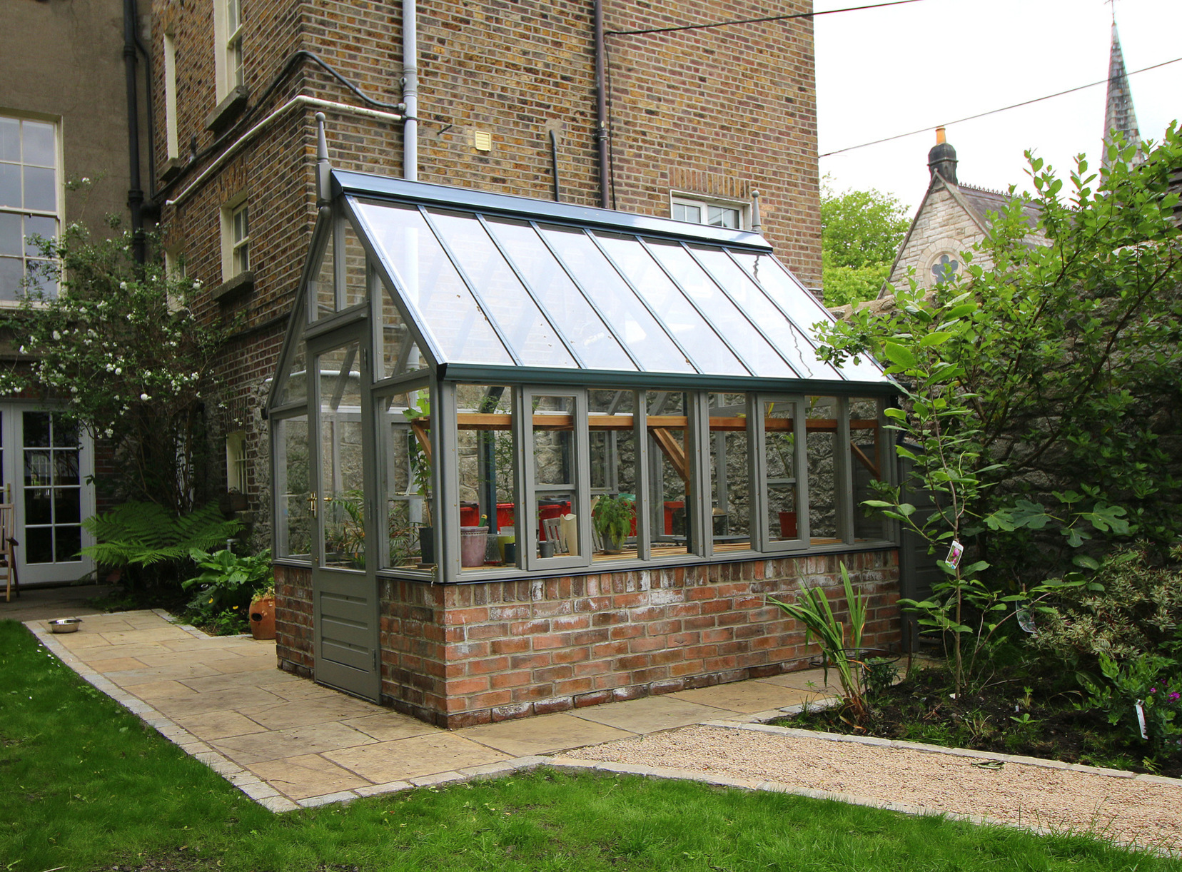 Painted RHS Hyde Hall Greenhouse on dwarf brick wall  | Traditional Victorian timber Greenhouse | Supplied + Fitted in Ranelagh, Dublin 6.