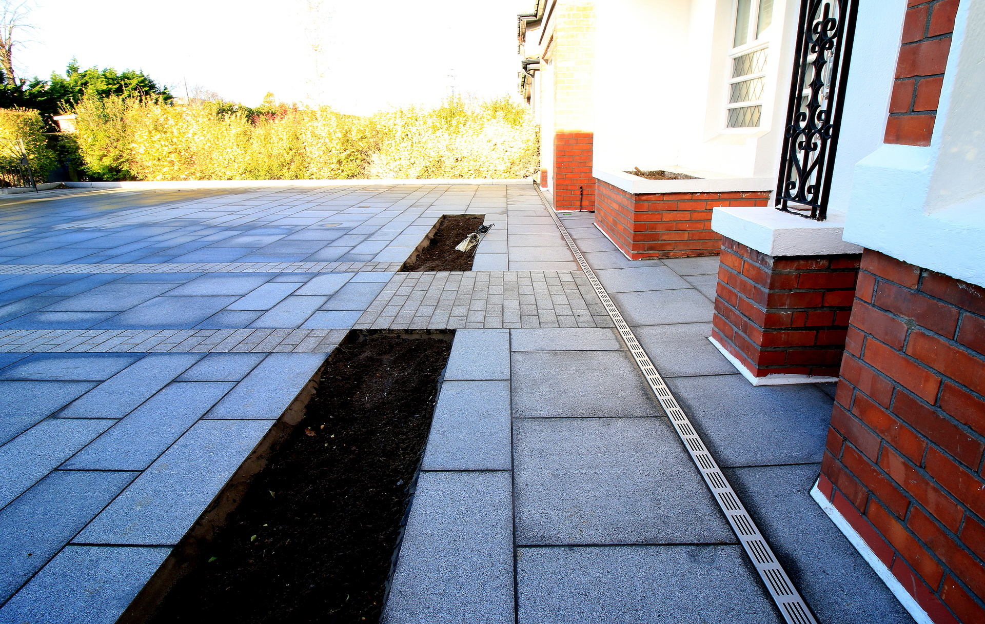 Driveway Design & Landscaping in Donnybrook, Dublin 4 in natural Granite paving I Owen Chubb Garden Designers & Landscapers