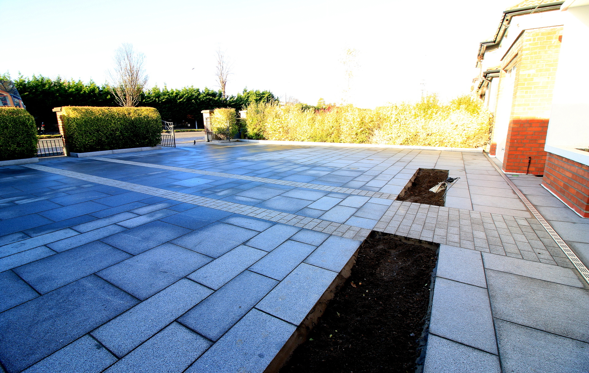 Driveway Design & Landscaping in Donnybrook, Dublin 4 in natural Granite paving I Owen Chubb Garden Designers & Landscapers