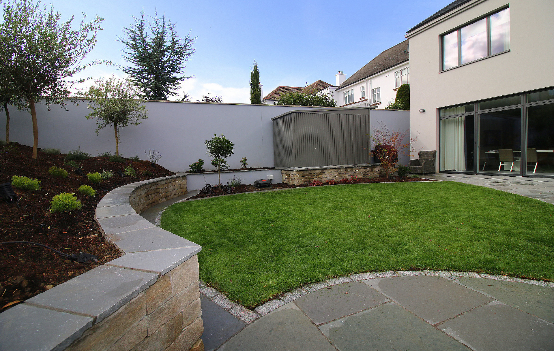 Distinctive curves are used very effectively to delineate key garden spaces & elements | Garden Design & Landscaping Rathfarnham