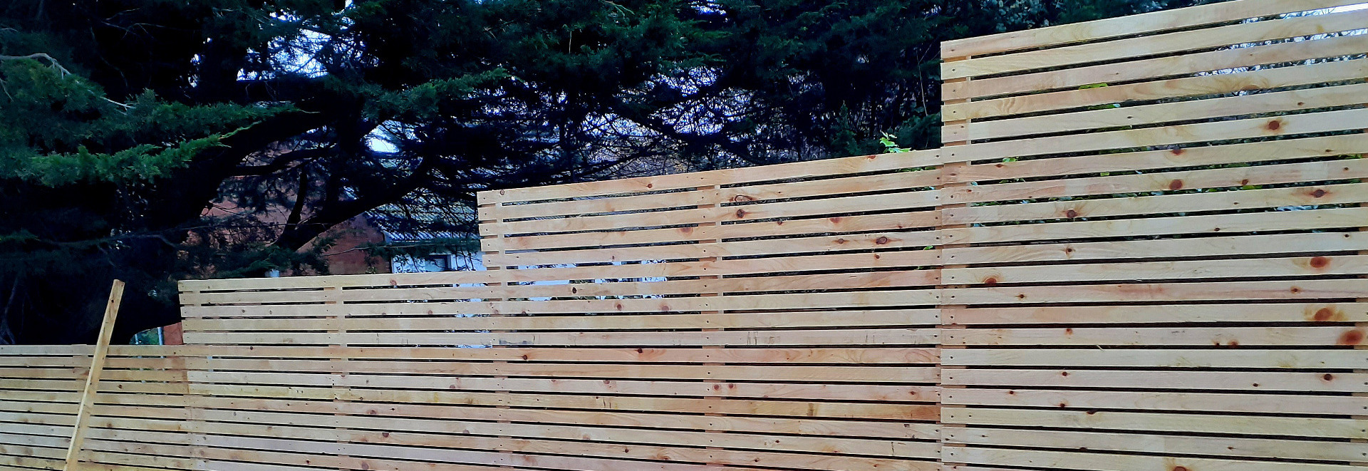 Custom made Timber Fencing featuring timber slats in a Rathfarnham Garden, Dublin 14 | Owen Chubb Garden Landscapers