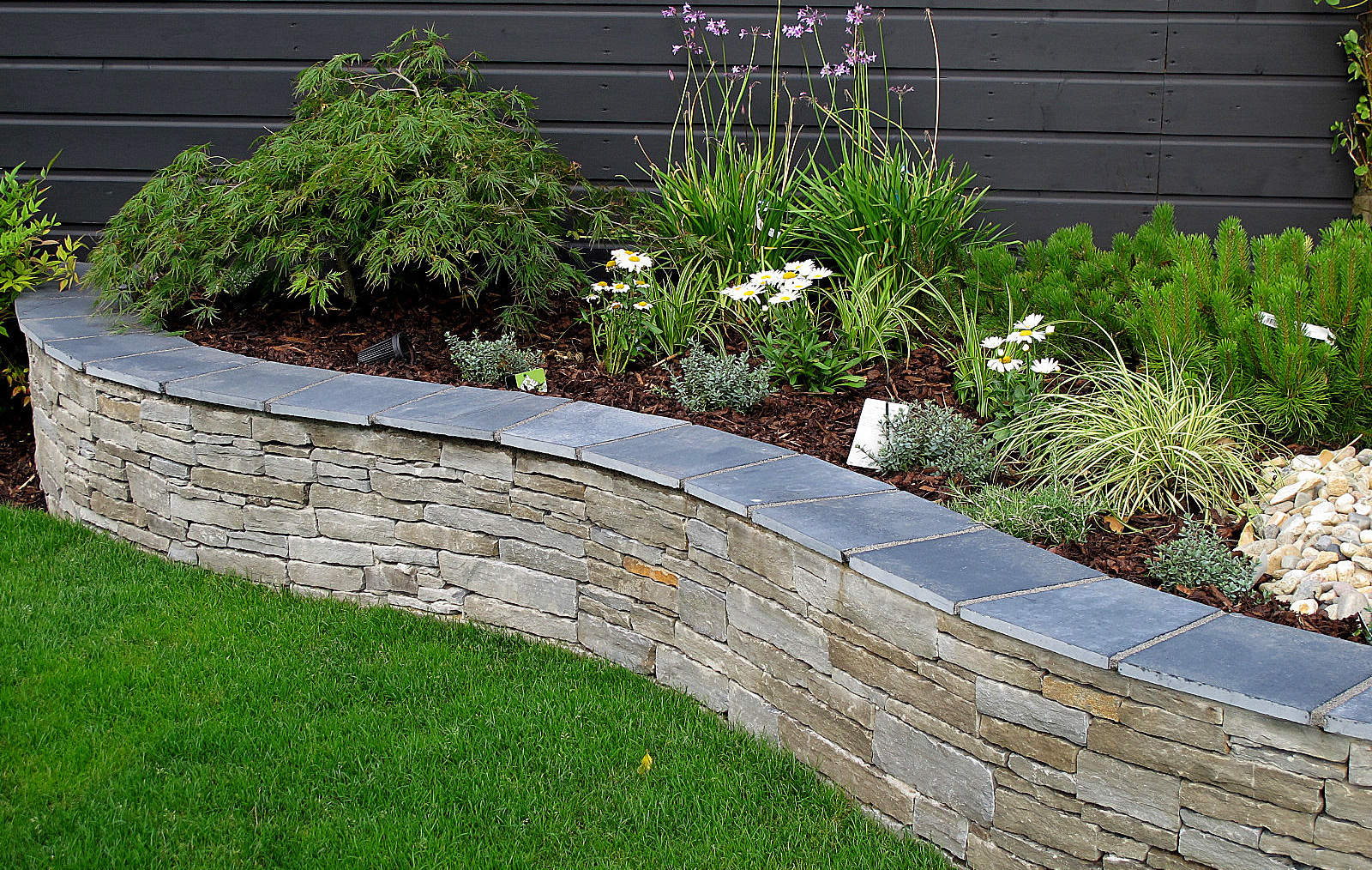 Raised Planting Bed in natural grey sandstone  | Owen Chubb Garden Landscapers