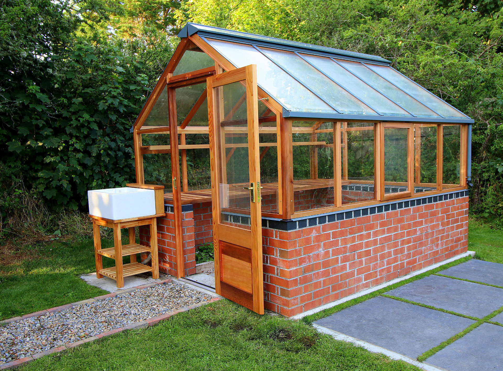 Classic Eight Greenhouse on brick wall with optional Osmo UV Wood protection & Belfast Sink on stand