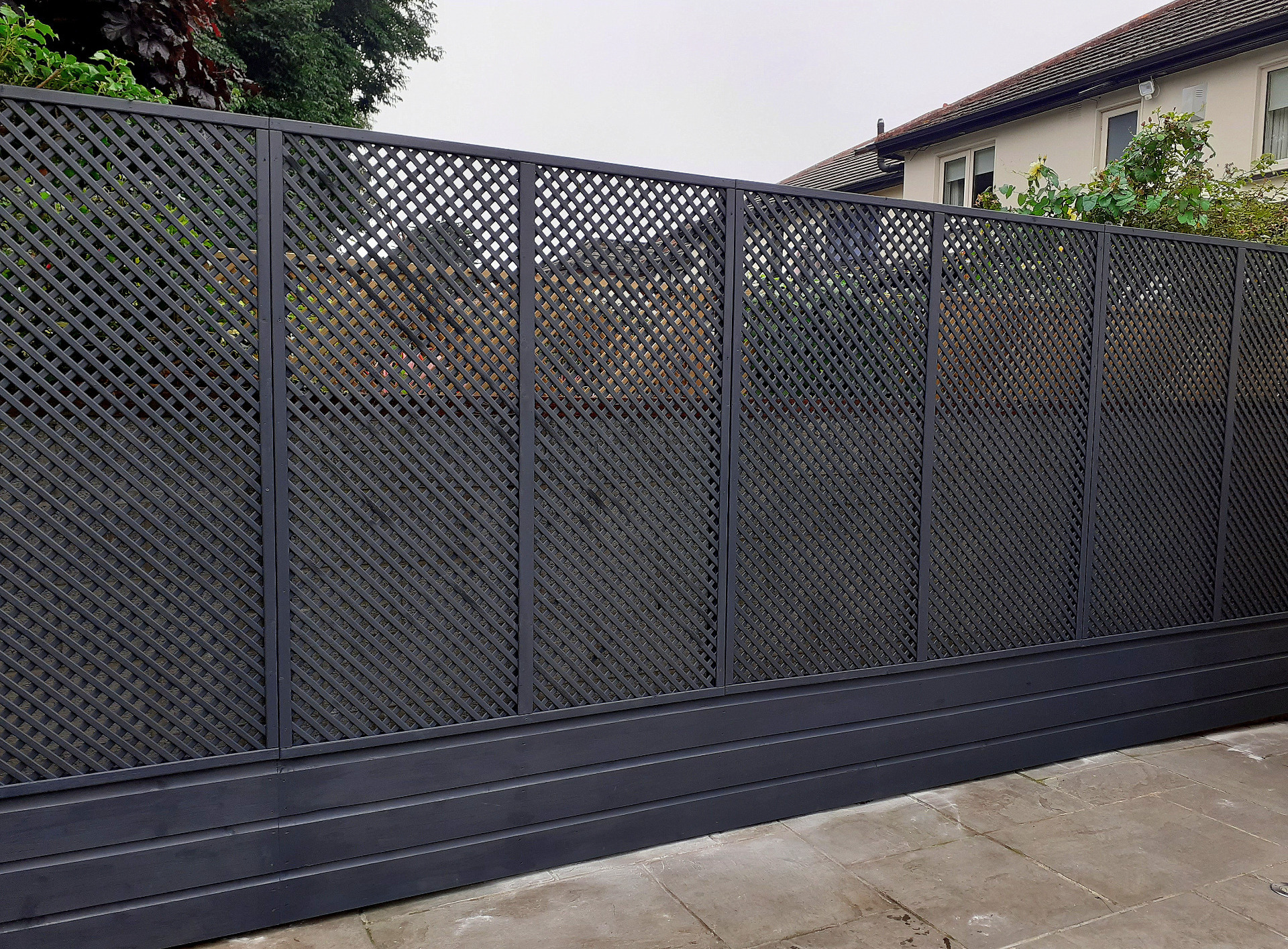 Custom garden fencing with painted finish