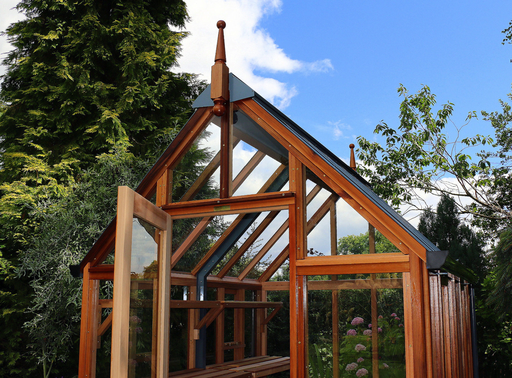 RHS Rosemoor Greenhouse with cedar base panels - traditional Victorian timber Greenhouse