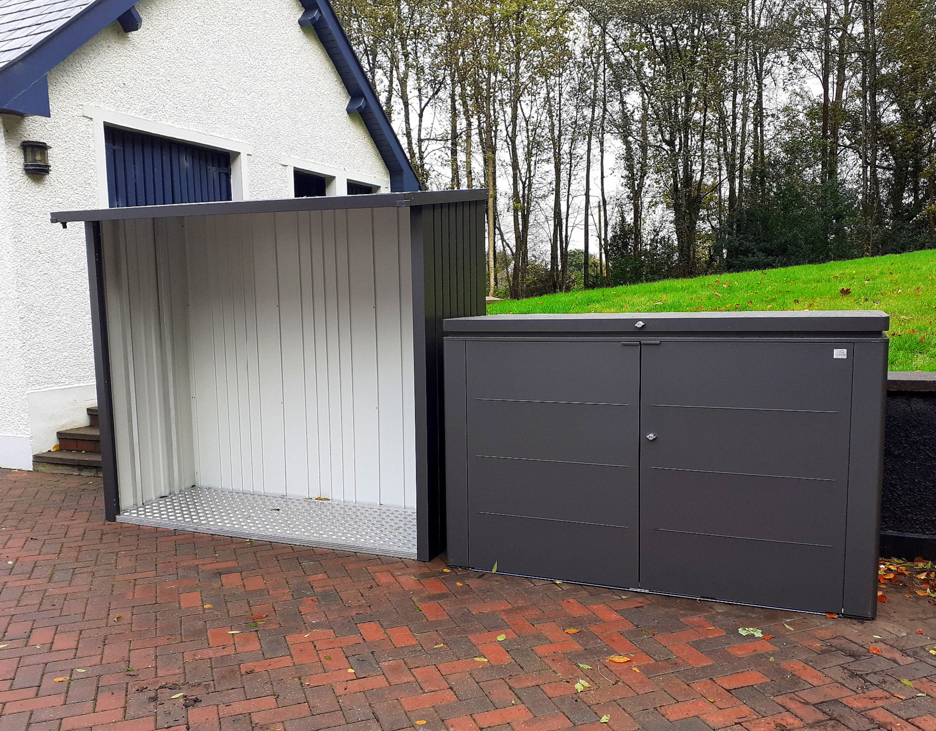 Biohort's Woodstock firewood storage unit alongside the HighBoard  Wheelie Bin storage unit | supplied + fitted in Donegal