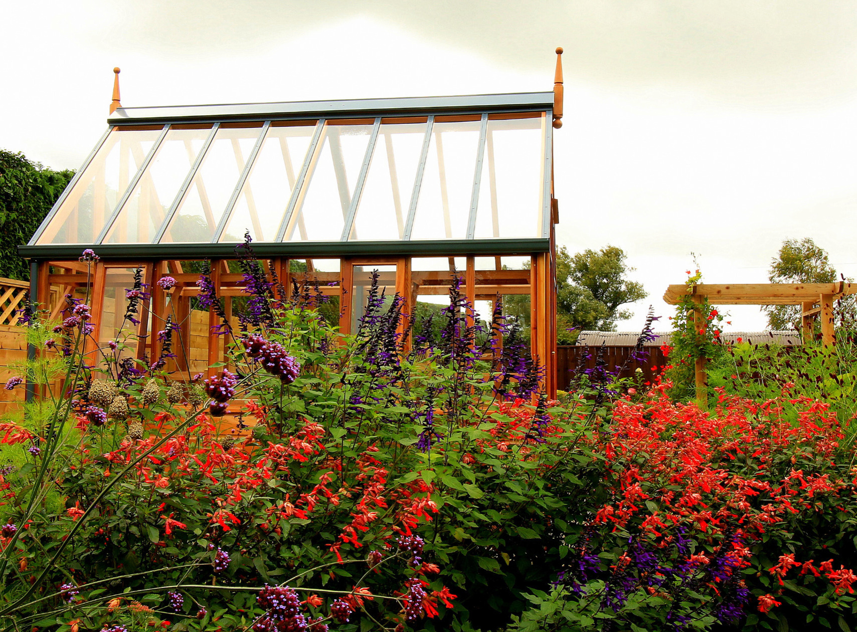 RHS Hyde Hall Greenhouse with UV timber protection - traditional Victorian timber Greenhouse