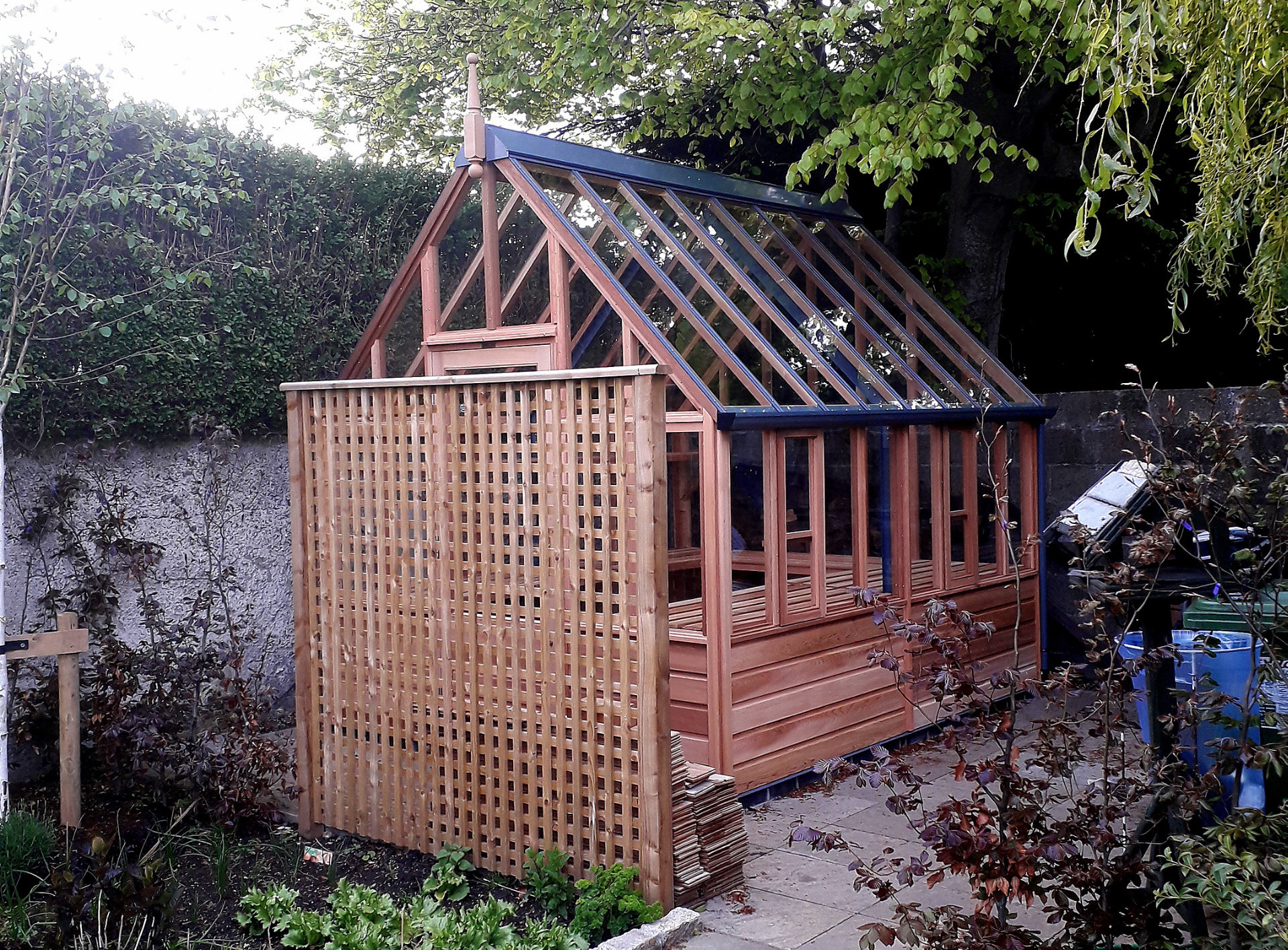 RHS Wisley Greenhouse with cedar base panels installation in Sandymount, Dublin 4.