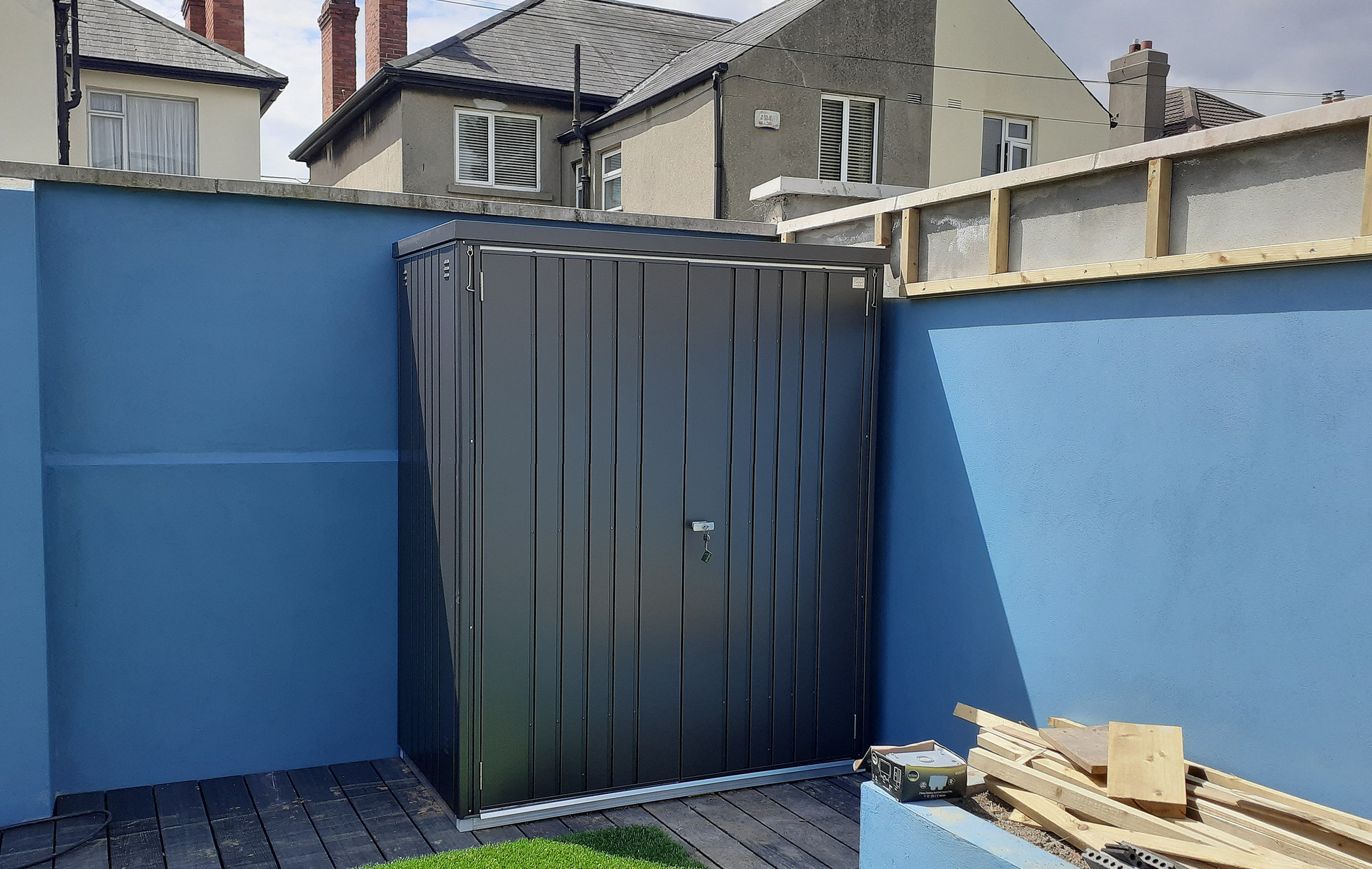 The superb quality and style of the Biohort Equipment Locker 150 in metallic dark grey  with optional accessories including aluminium floor frame, aluminium floor panels | supplied + installed in Glasnevin by Owen Chubb Landscapers. Tel 087-2306 128.