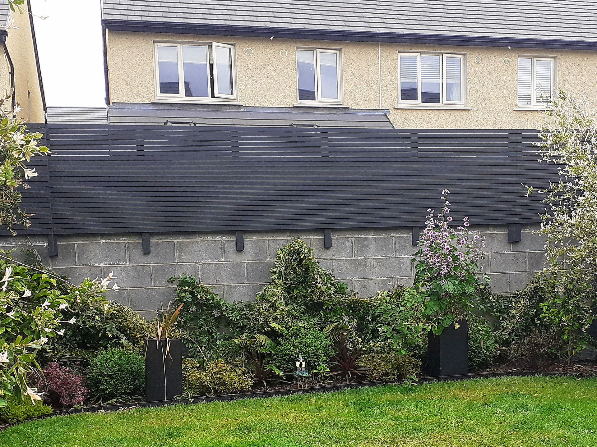 Custom made Timber Fencing featuring timber slats with painted (Colourtrends) finish, supply & installation in Ballycullen, Dublin 24 | Owen Chubb Garden Landscapers