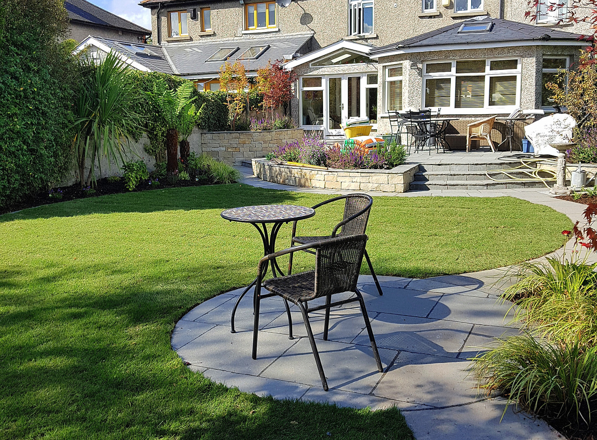 Raised Patio  with integrated Raised Planter Beds in Terenure |Owen Chubb Garden Landscapers