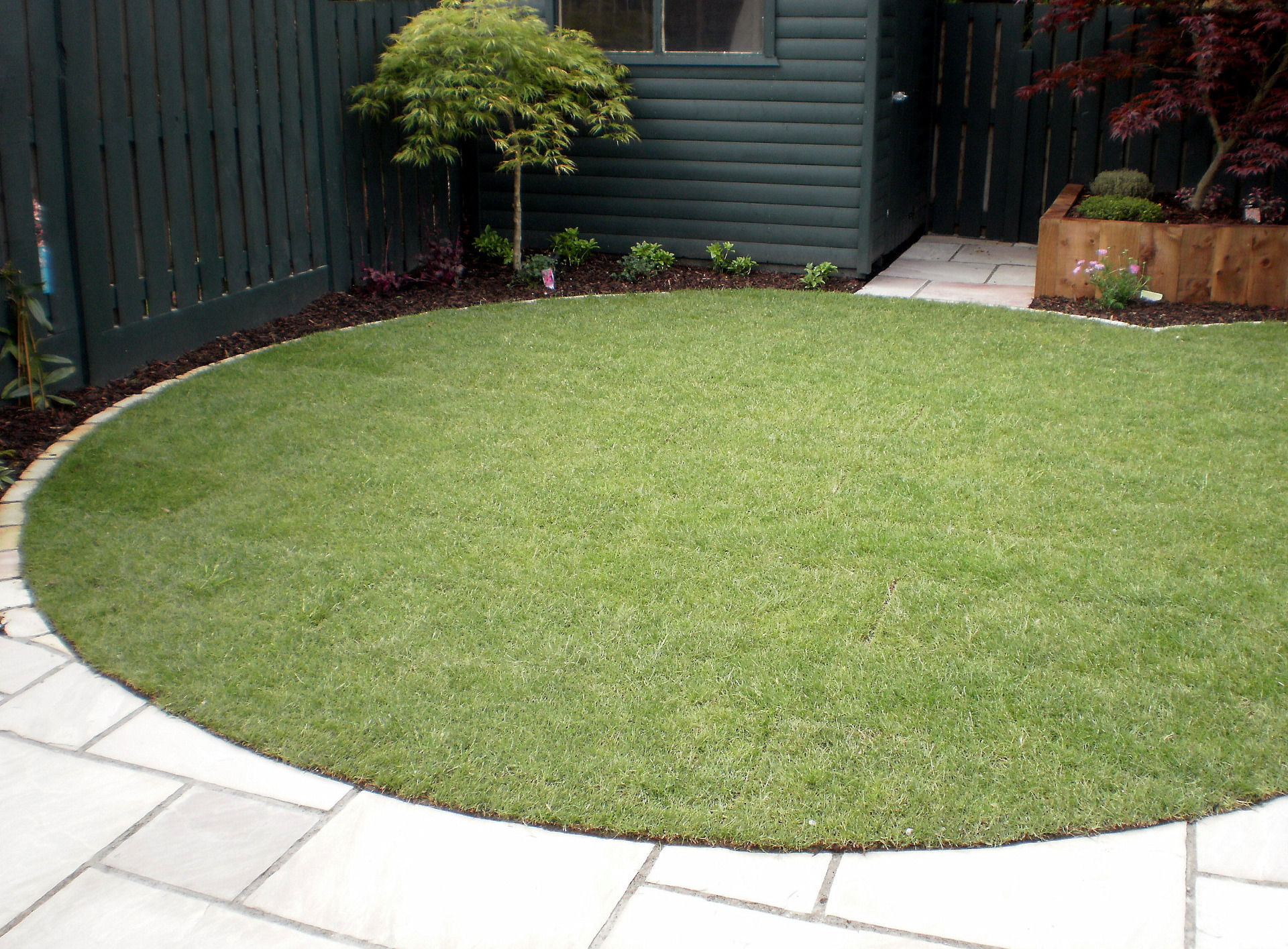 Patio design for small garden in Rathfarnham, based on circular theme | Owen Chubb Garden Designe circular