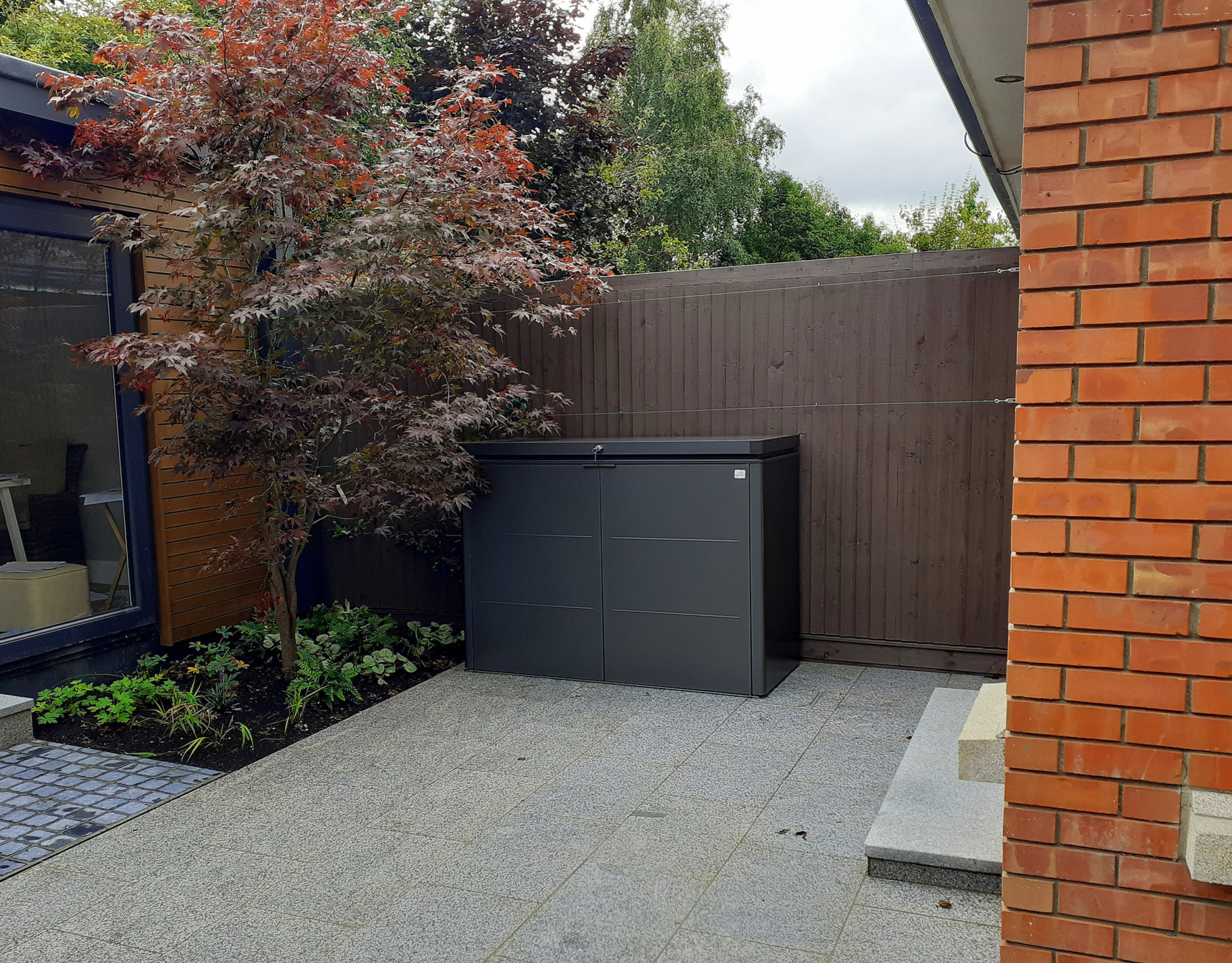 Biohort HighBoard 160 Garden Storage Unit in metallic dark grey fitted with optional intermediate shelving, supplied & fitted in Castleknock, Dublin 15   | Owen Chubb Ireland's Leading supplier of Biohort Garden Sheds & Storage Solutions | FREE Fitting in Dublin