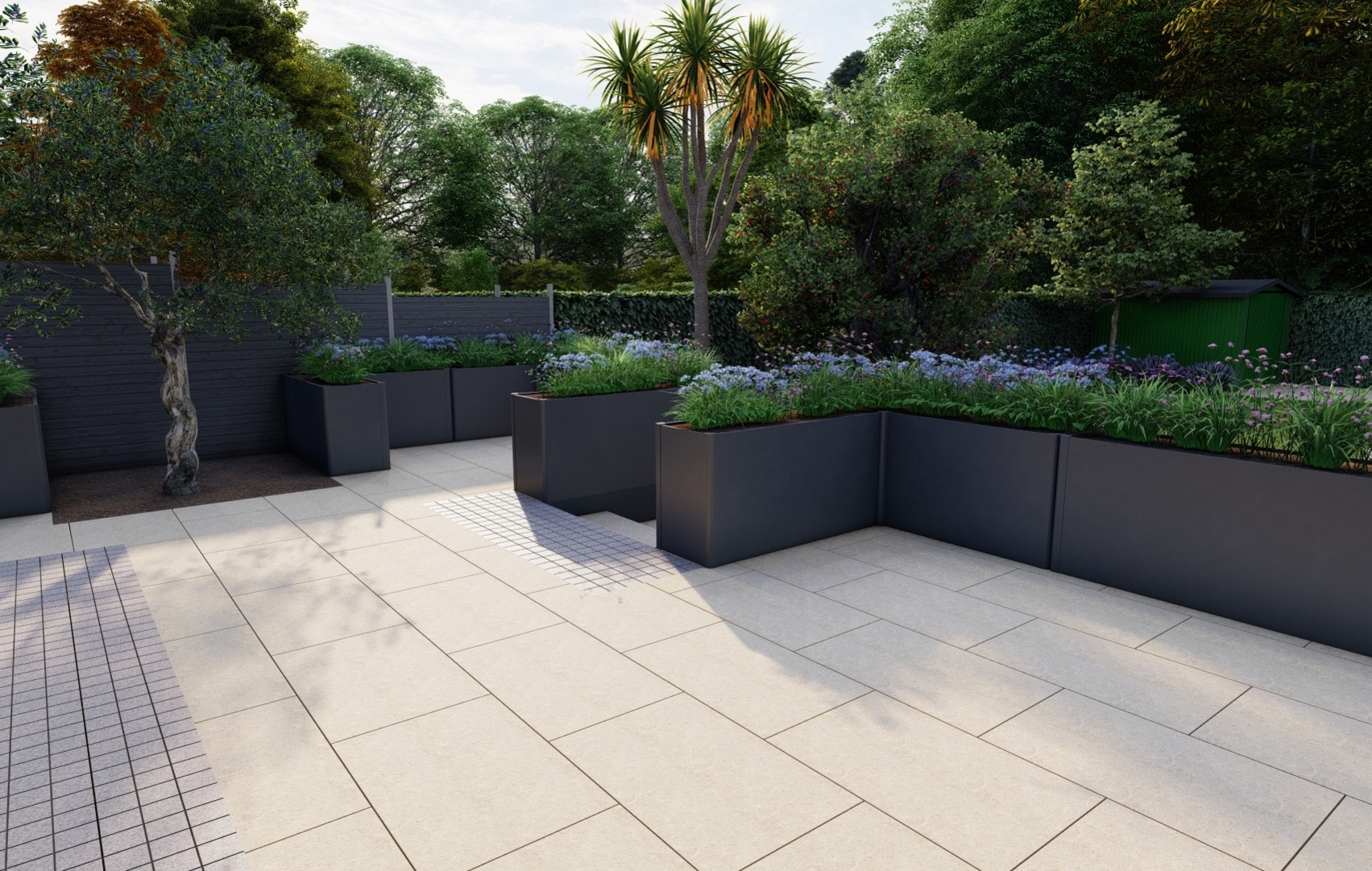 A Garden Design for a large Family garden in Mount Merrion, Co Dublin features an expansive  Raised Patio with the emphasis on the provision of space for separate formal & casual dining areas framed by stunning Biohort Steel Planters, Egyptian Limestone paving, colourful low maintenance Herbaceous planted borders and large lawn area |   Owen Chubb Garden Design, Tel 087-2306 128