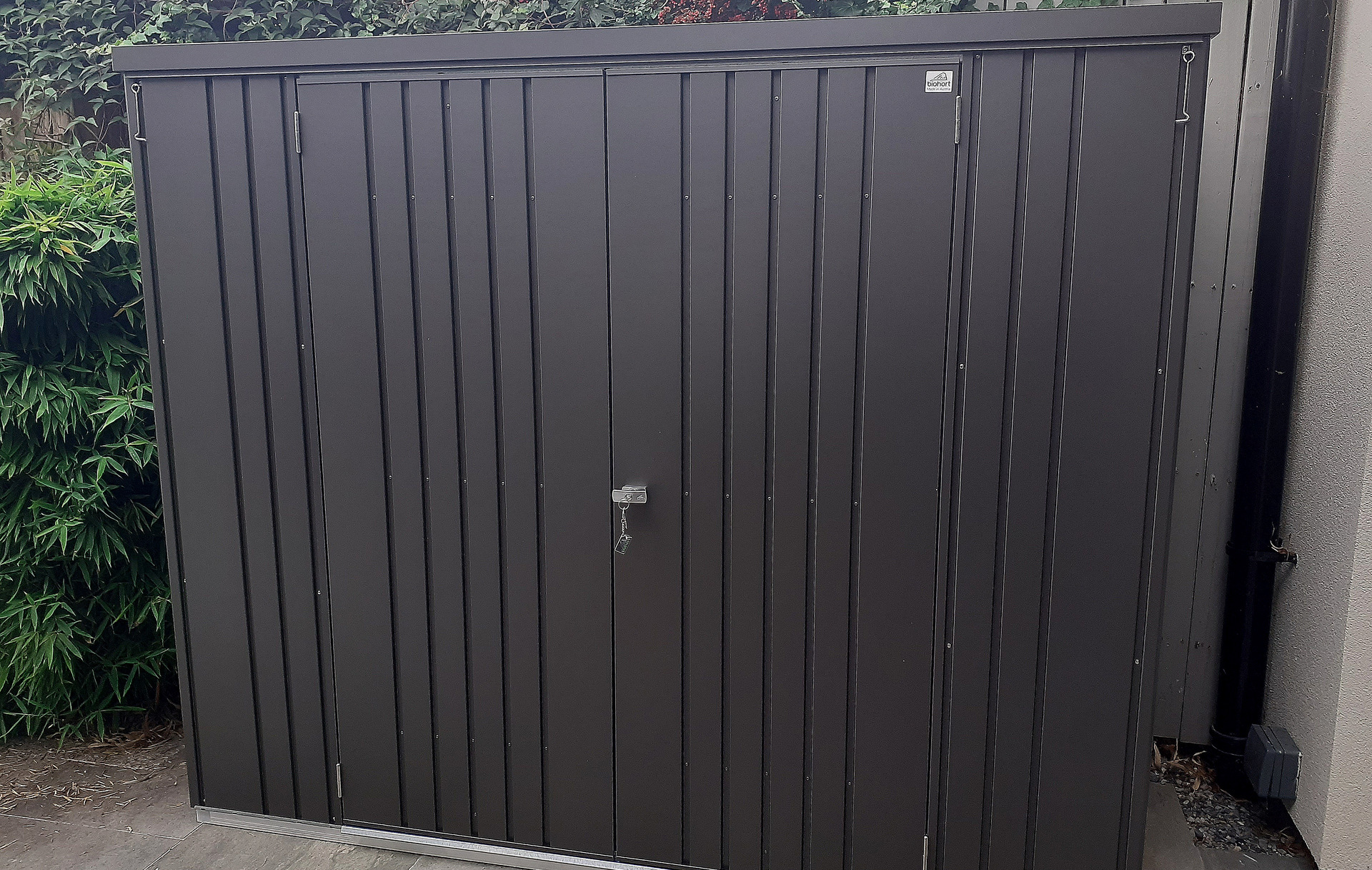 The superb quality and style of the Biohort Equipment Locker 230 in metallic dark grey  with optional accessories including aluminium floor frame, aluminium floor panels | supplied + installed in Terenure, Dublin 6W by Owen Chubb Landscapers. Tel 087-2306 128.