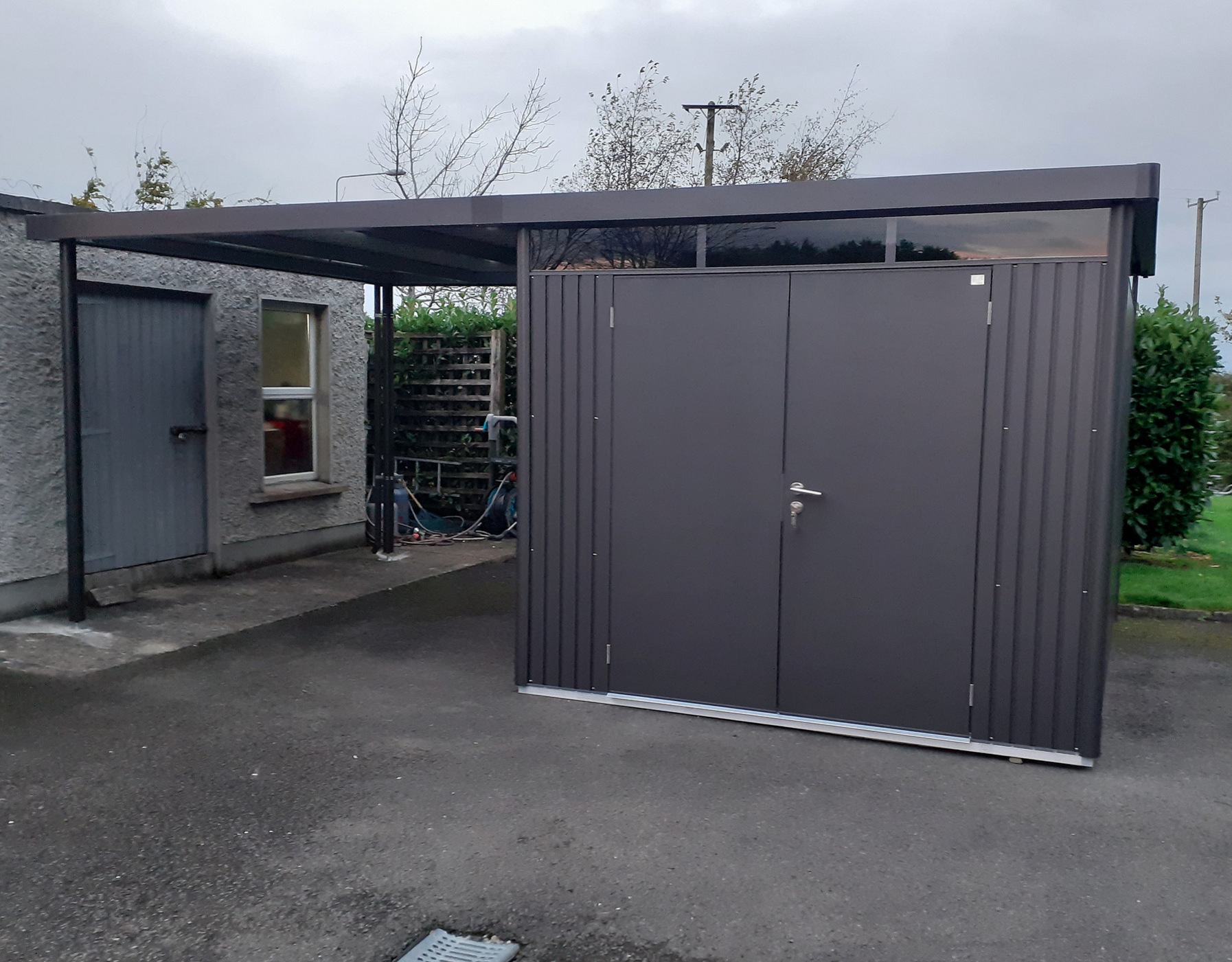 The Biohort HighLine H5 Steel Garden Shed in metallic dark grey with optional accessories including Side Canopy, Double Doors, aluminium floor frame, aluminium floor panels, supplied + fitted in Co Kildare | Owen Chubb Garden Landscaper - Ireland's #1 Biohort Dealer, your one-stop shop for Biohort Sheds & Storage. Shop with confidence. Best Prices in Ireland. Fast Delivery & Installation nationwide. Tel 087-2306128.