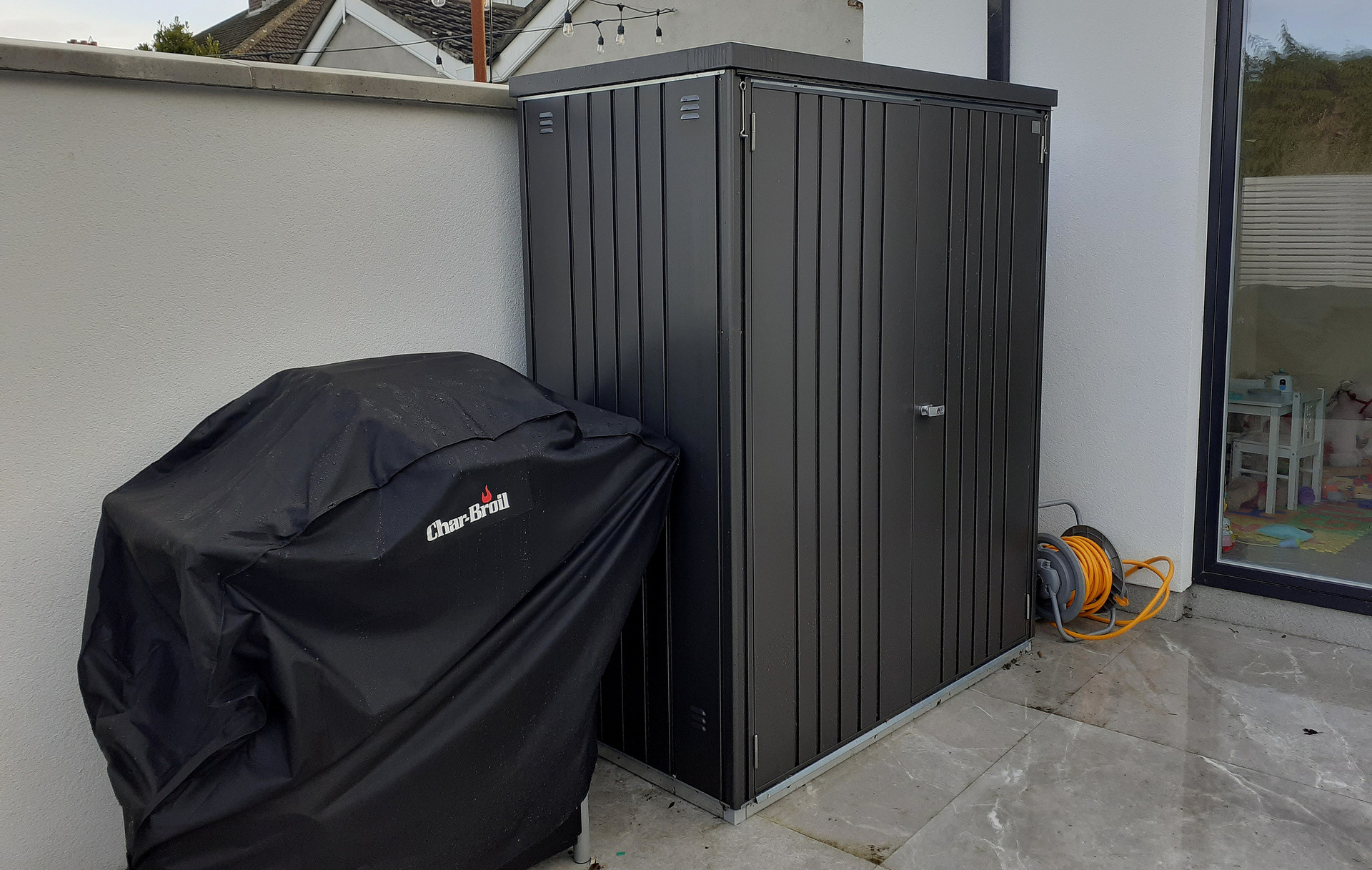 The superb quality and style of the Biohort Equipment Locker 150 in metallic dark grey  with optional accessories including aluminium floor frame, aluminium floor panels | supplied + installed in Goatstown, Dublin 14 by Owen Chubb Landscapers. Tel 087-2306 128.