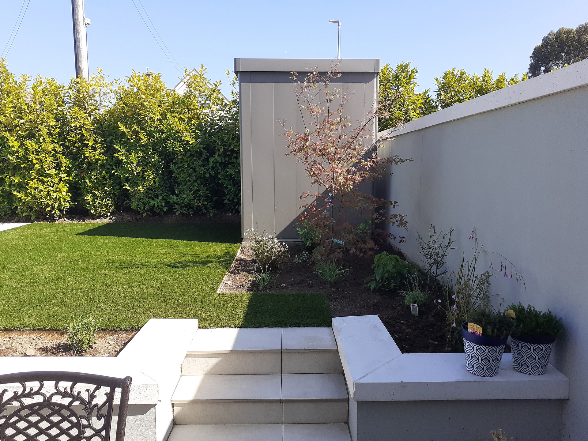 Biohort Neo Garden Shed, Size 1B in metallic quartz grey - supplied + fitted in Killiney, Co Dublin by Owen Chubb Landscapers, Ireland's Premier Biohort Supplier and Trained & Certified Installation Partner.