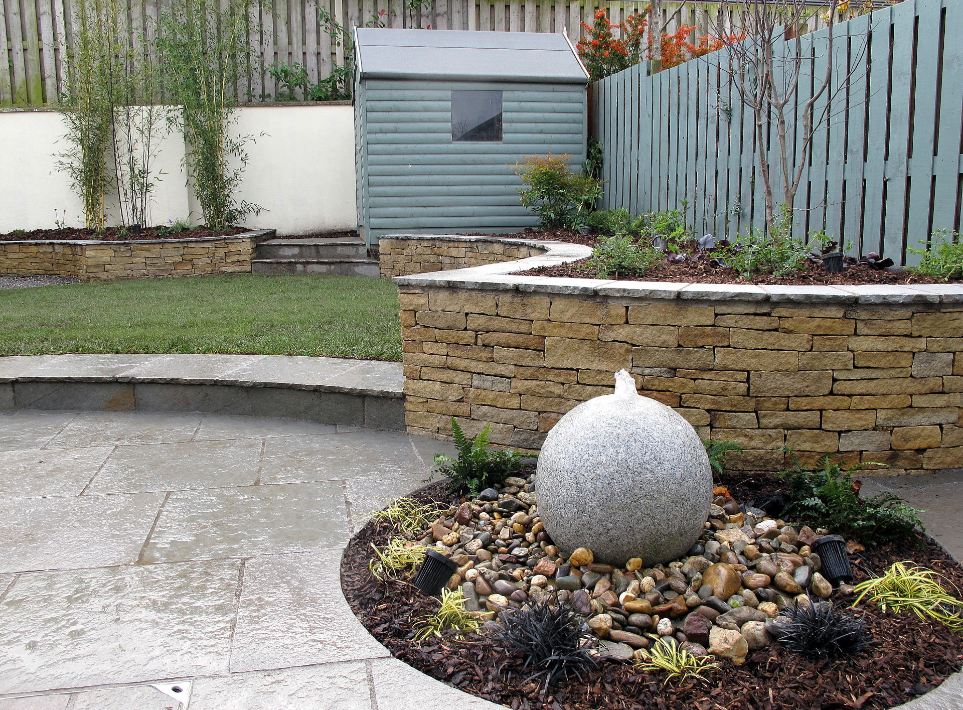 Curving Raised Planter Beds in natural stone | Knocklyon