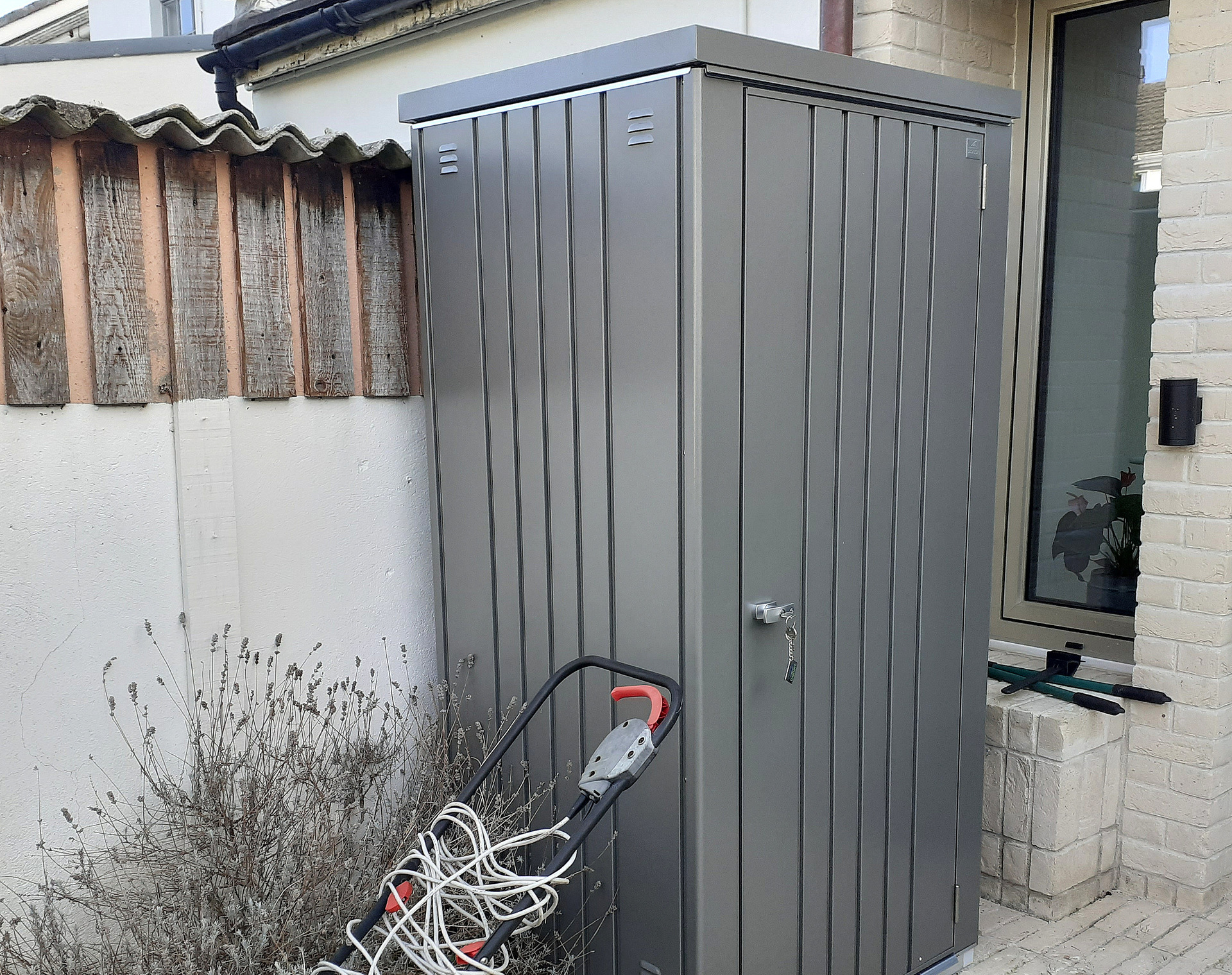 Biohort Equipment Locker 90 in metallic quartz grey, supplied + fitted in Sandymount, Dublin 4 | Stylish, Versatile, Secure & Rainproof Compact Garden Storage Solution