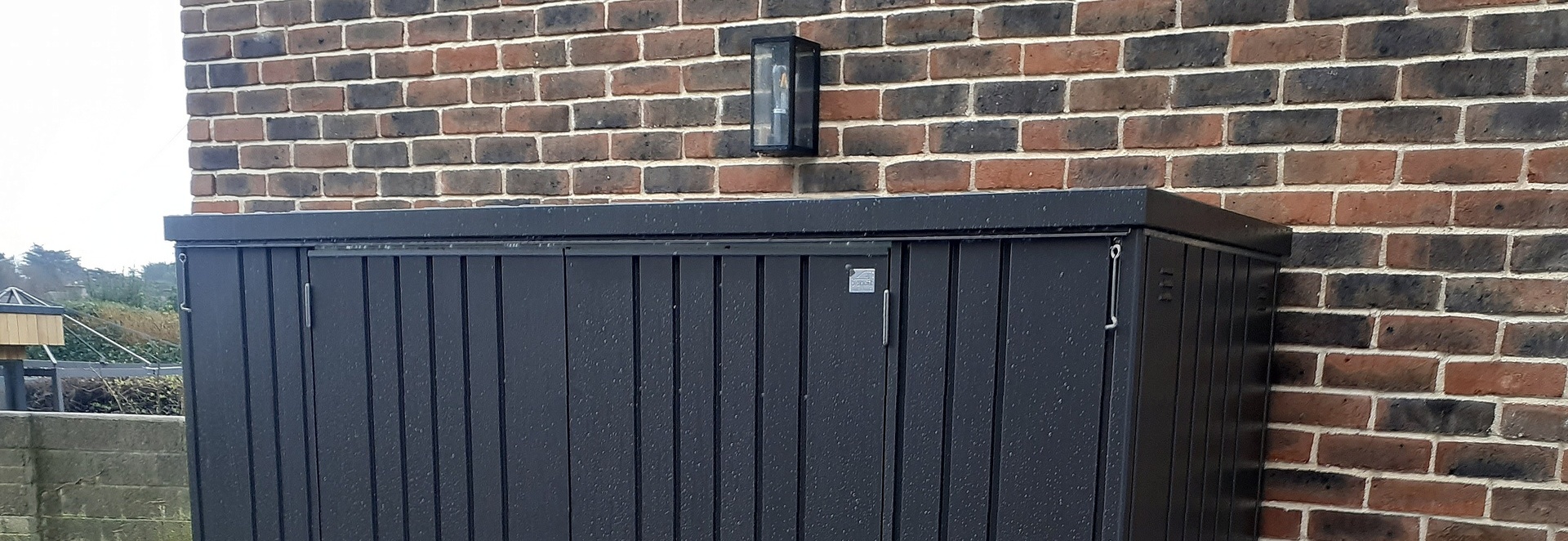 Biohort Equipment Locker 230 in metallic dark grey | premium quality steel storage shed for patio & garden | Supplied & Fitted by Owen Chubb in Glenageary, Co Dublin | BEST PRICES in Ireland | Tel 087-2306 128