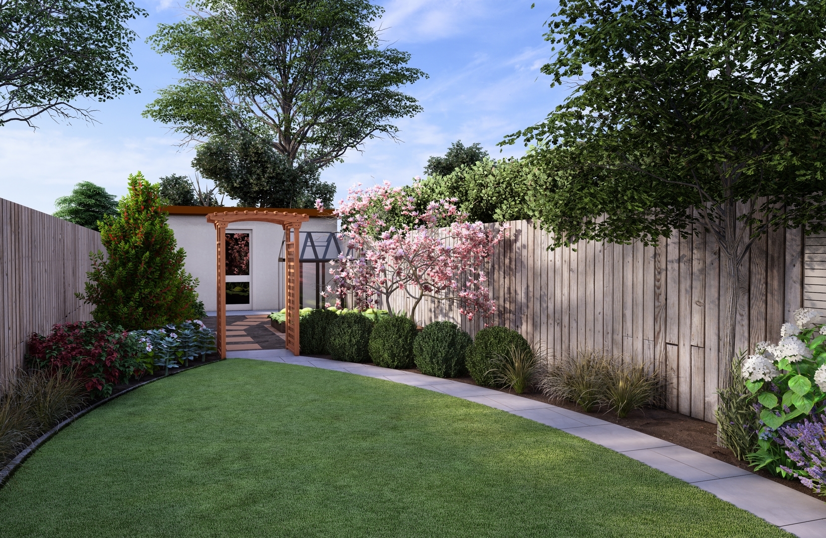 Garden Design Dublin D6W features natural limestone paving, bespoke horizontal timber slat fencing, natural drystone Raised Planter, specimen trees and colourful perennial planted borders.