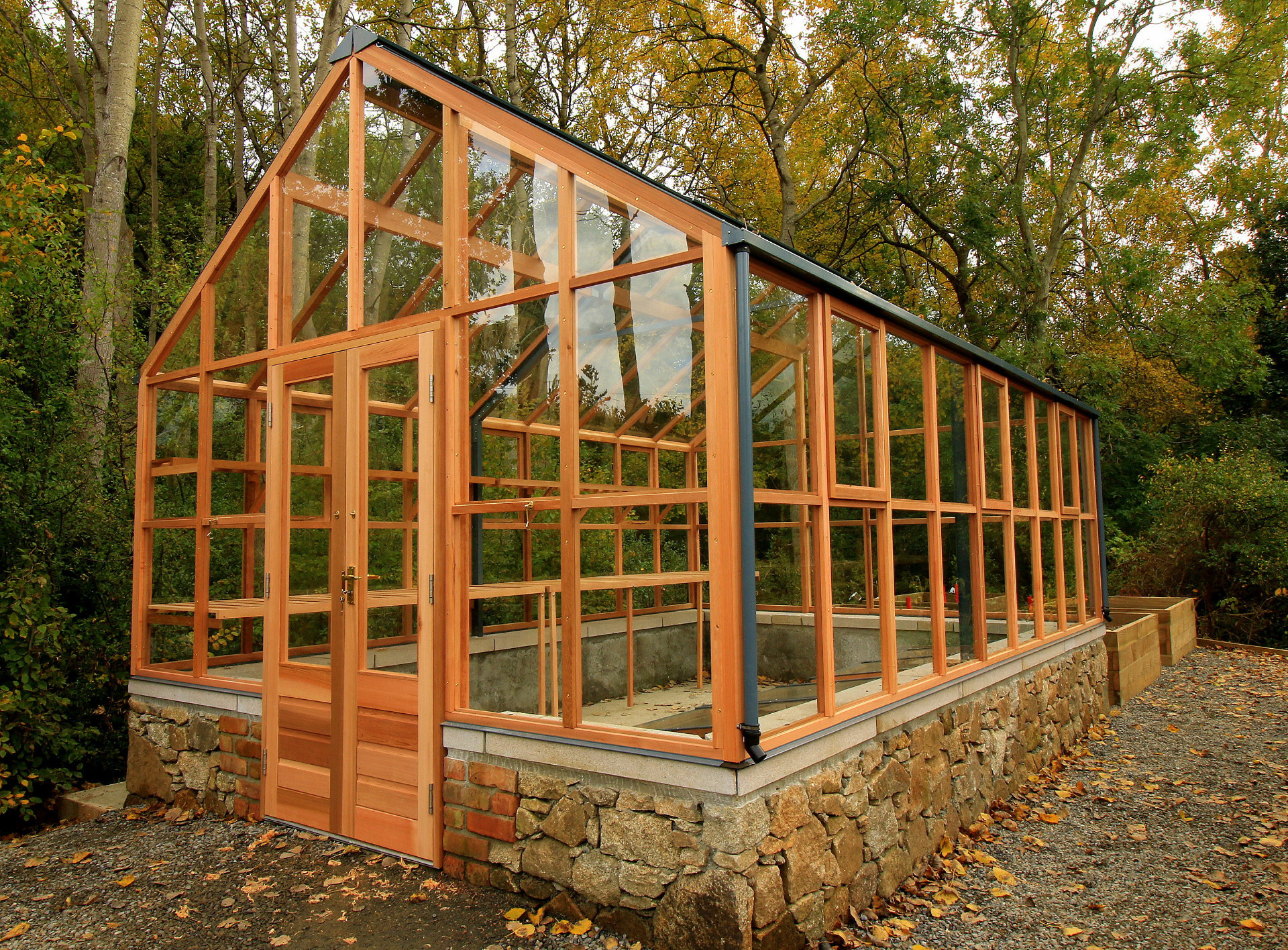 Gabriel Ash Classic Ten Planthouse on stone wall in Kilternan, Dublin 18 | the only timber greenhouses endorsed by the RHS | Owen Chubb  087-2306128