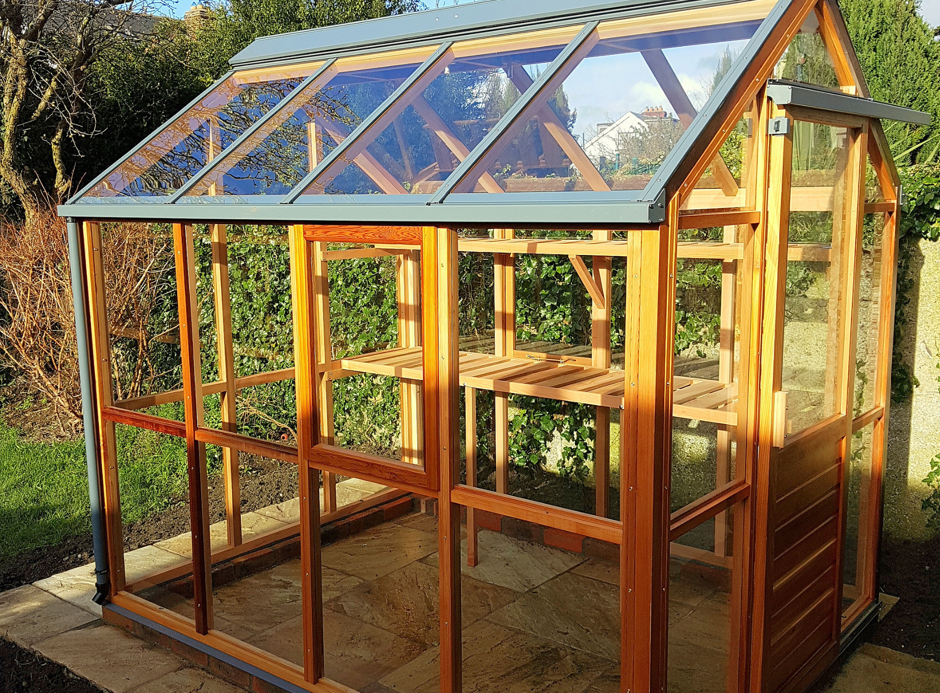 Classic Six Greenhouse (6x8) with glass base panels, sliding door and UV timber protection | Classic Timber Greenhouses supplied + fitted by Owen Chubb nationwide. Tel 087-2306 128
