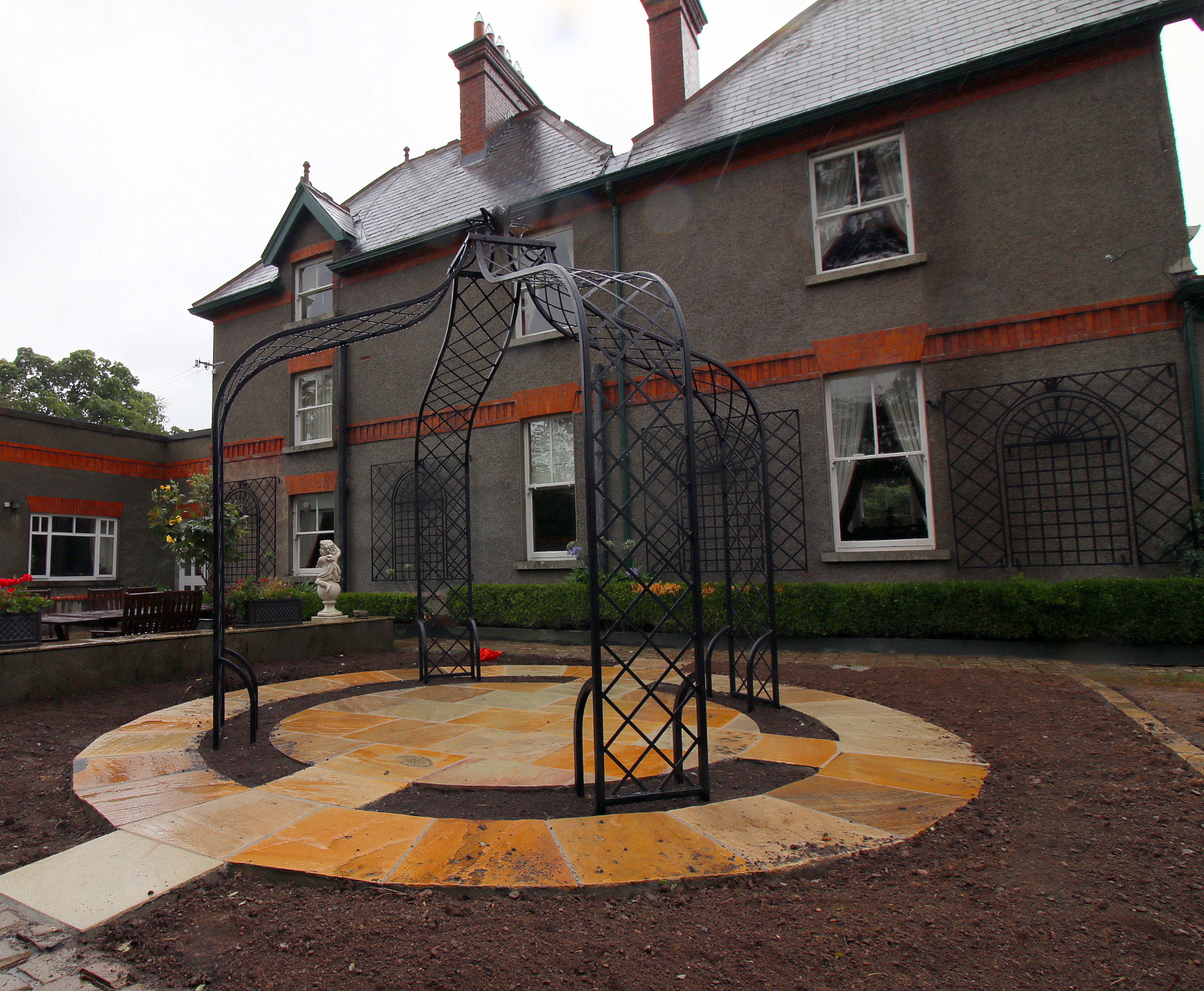 The Victorian Kiftsgate Rose Pavilion, supplied + installed by Owen Chubb Garden Landscapers. Tel 087-2306128